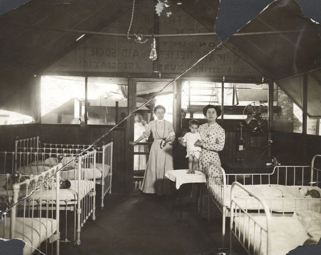 Women nursing babies at Chicago Relief and Aid Society facility