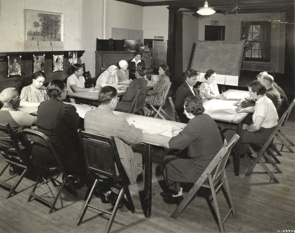 Miniature of Adults studying in English class
