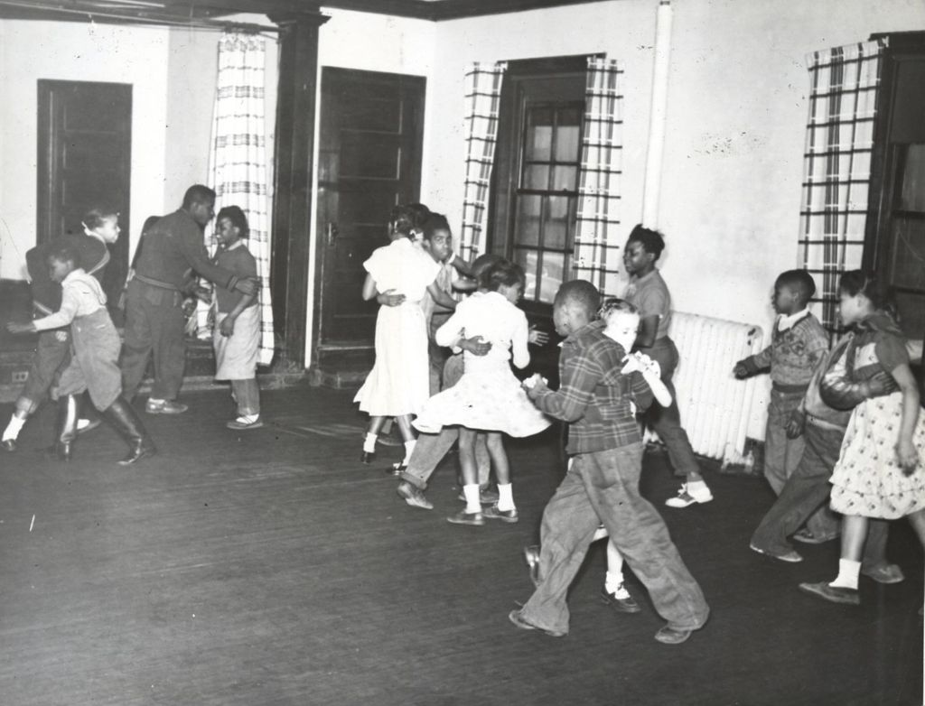 Children and teens dancing at a party