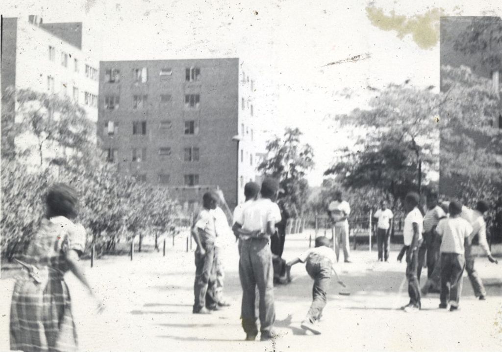 Children playing outside Public Housing apartment buildings