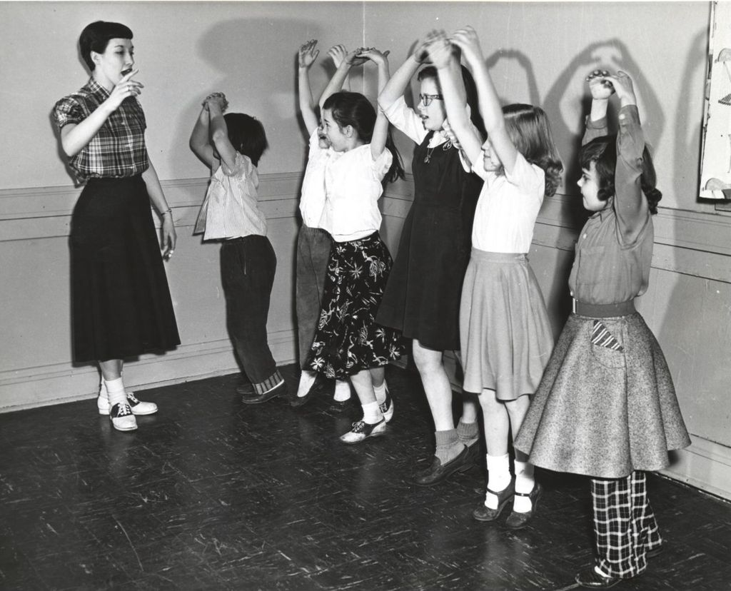Children in ballet class with instructor