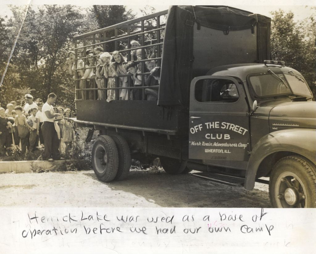 Children in an Off-The-Street Club camp truck