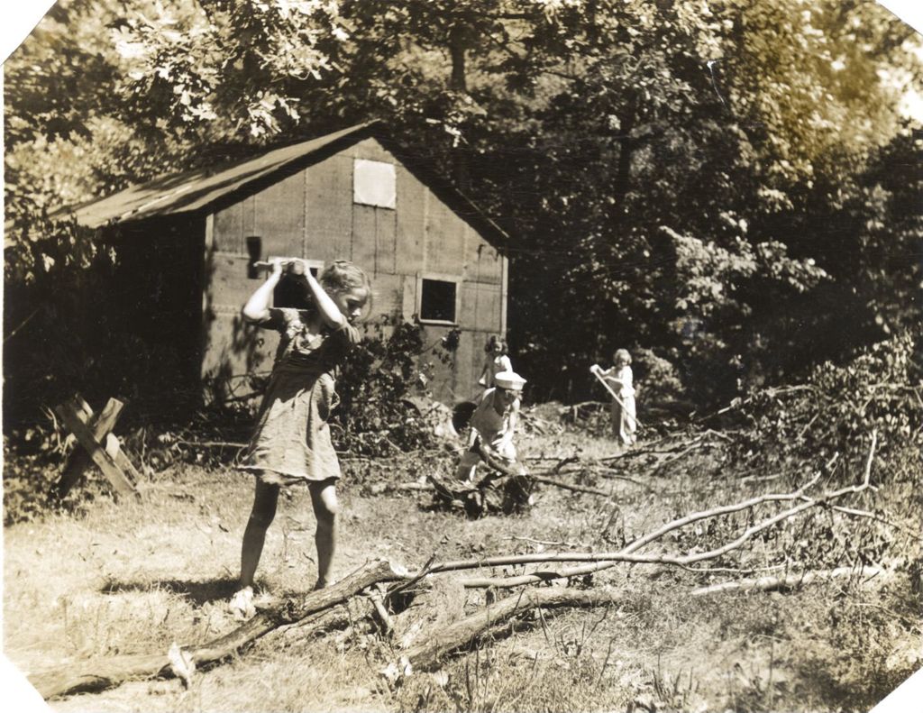Clearing land around a dormitory, Mark Twain Adventure Camp