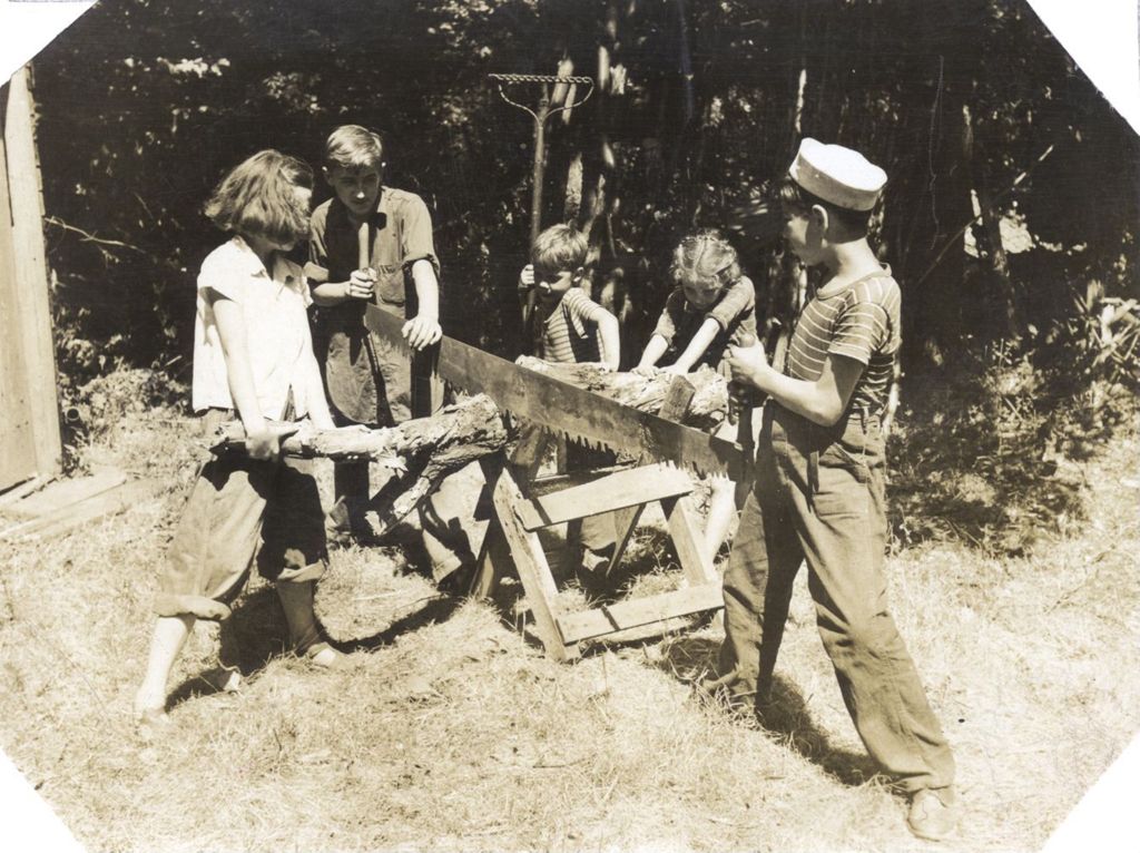 Miniature of Children sawing logs for campfire
