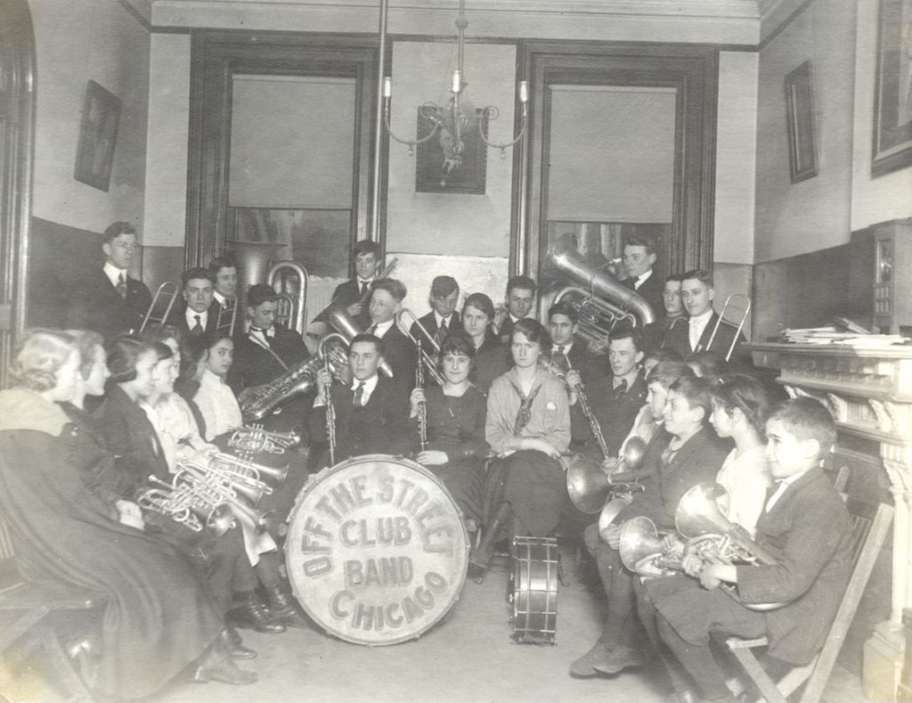 Miniature of Off-The-Street Club brass band members with instruments