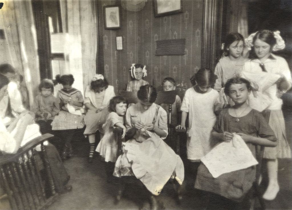 Miniature of Girls working on hand-sewing projects