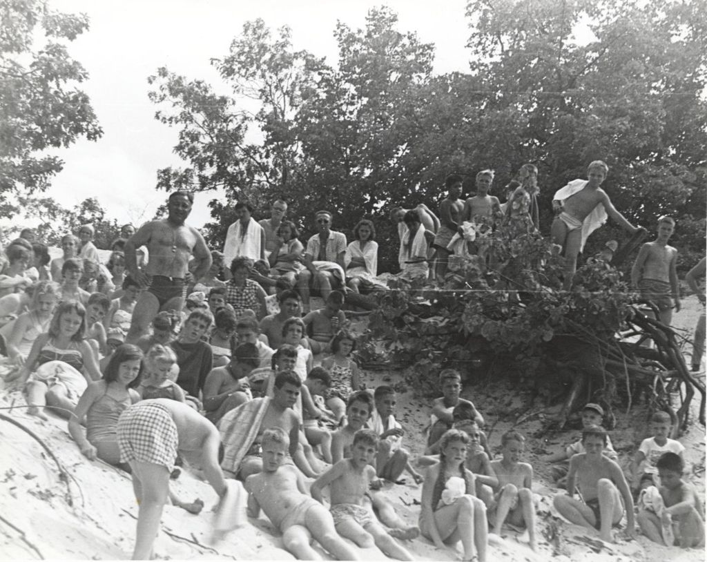 Children and adults at the beach