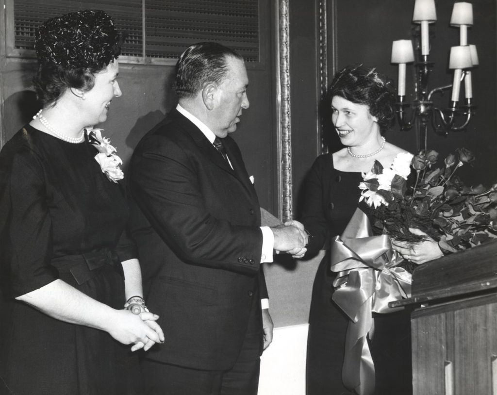 Miniature of Mayor Daley presenting Volunteer of the Year award to Mrs. H.C. Harlan