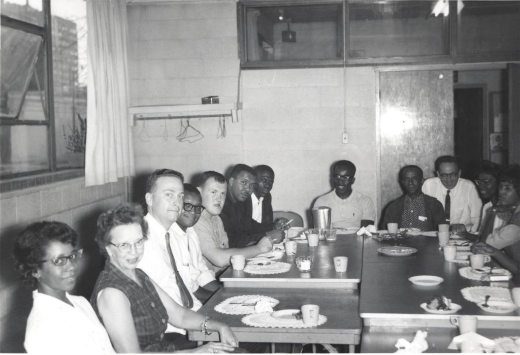 Hyde Park Neighborhood Club staff seated at tables