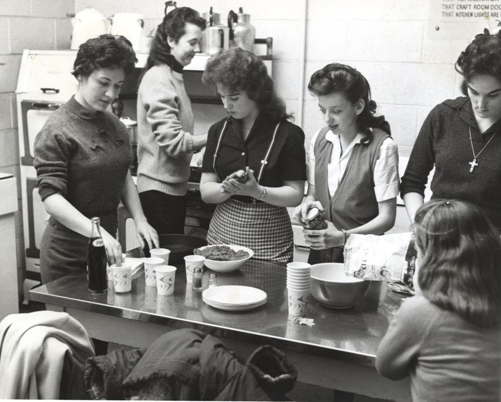 Women preparing snacks, Hyde Park Neighborhood Club kitchen