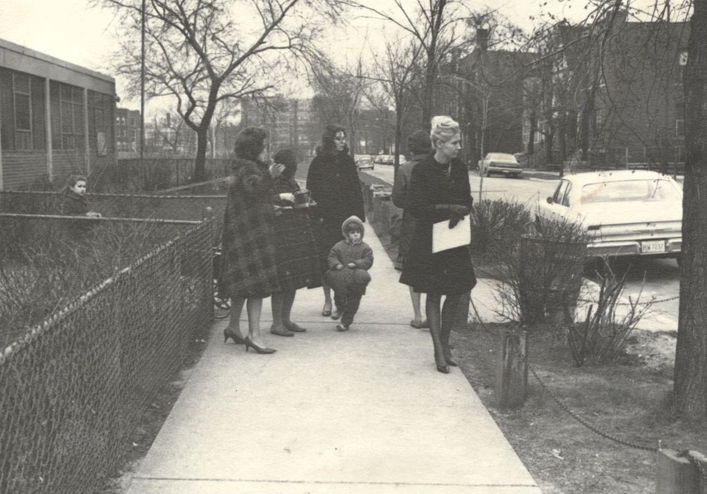 Women and children outside the Hyde Park Neighborhood Center
