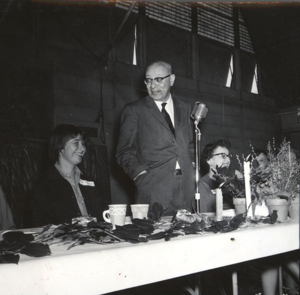 Man speaking at a lunch event