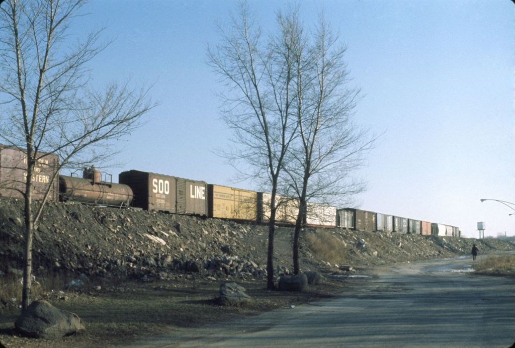 Freight train on raised embankment