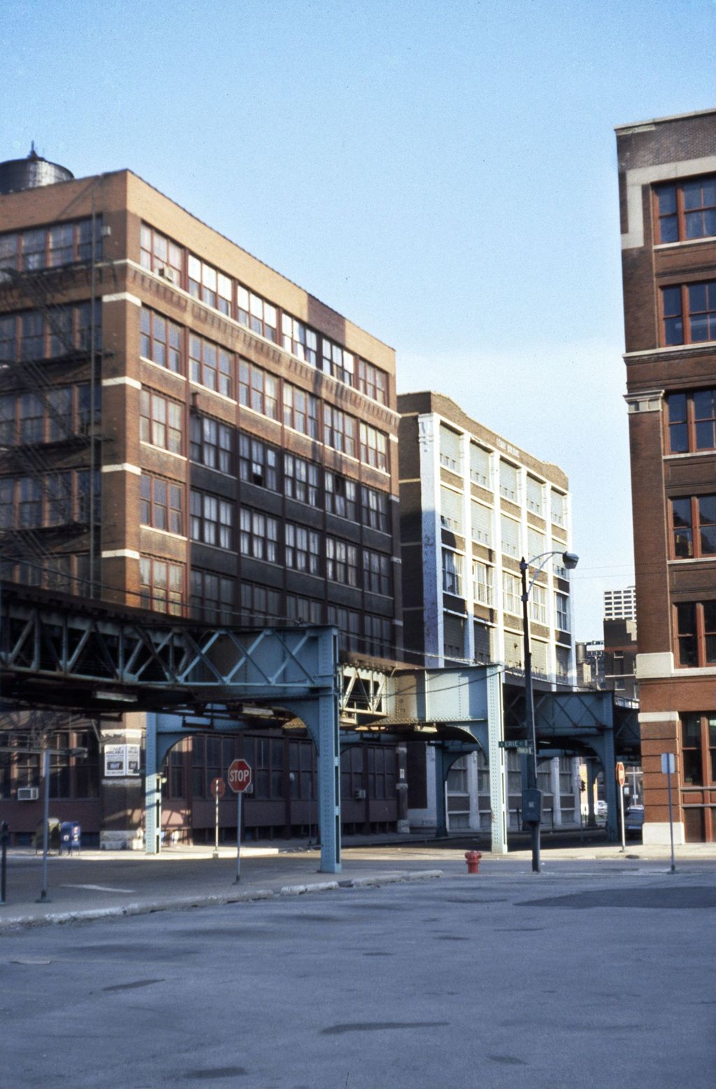 Industrial buildings and elevated train tracks, North Franklin Street