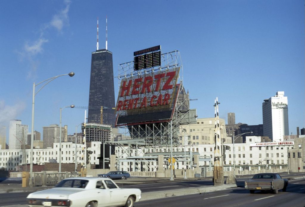 Cityscape with Hertz sign and John Hancock Center