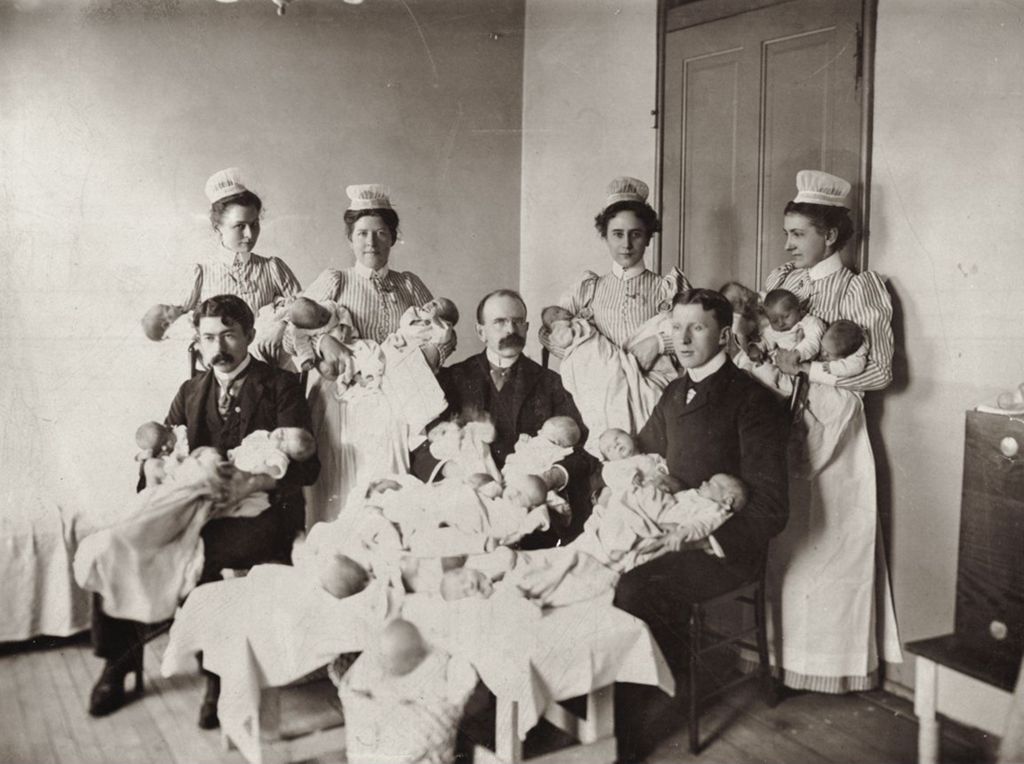 Miniature of Medical staff holding infants