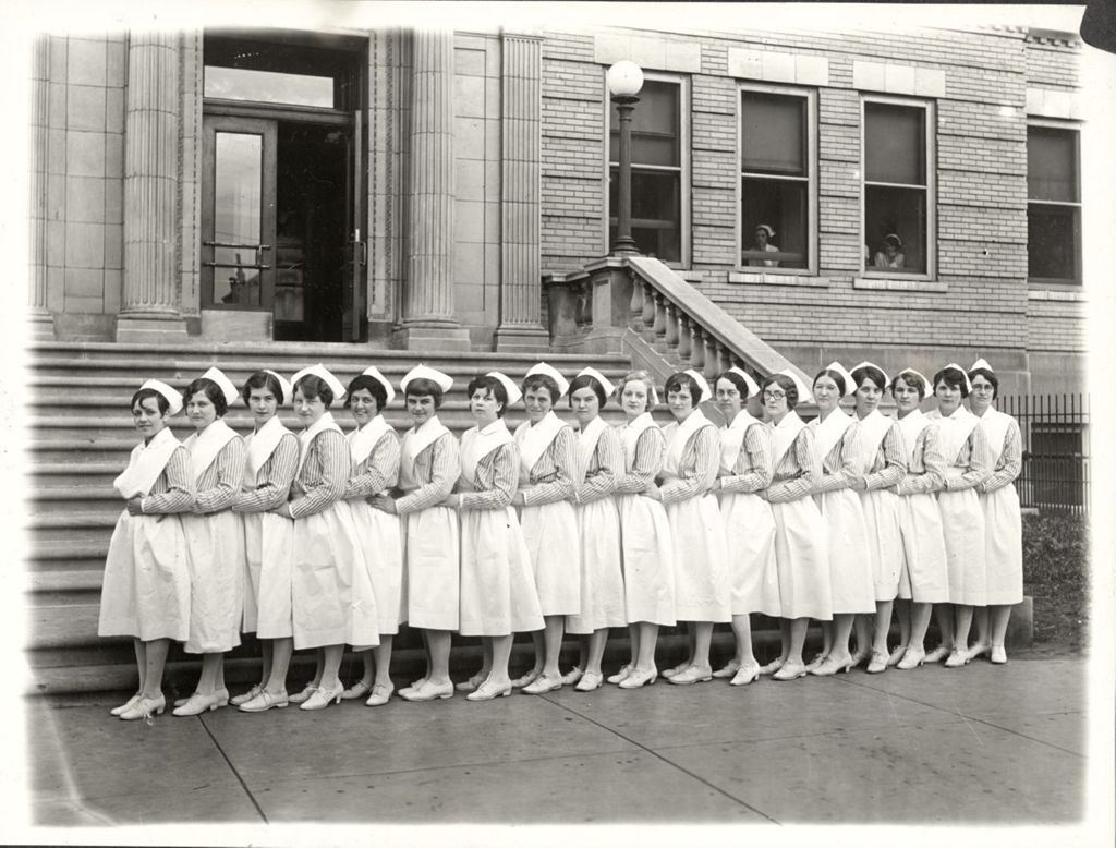 Miniature of Illinois Training School for Nurses class photo in front of steps, individuals identified