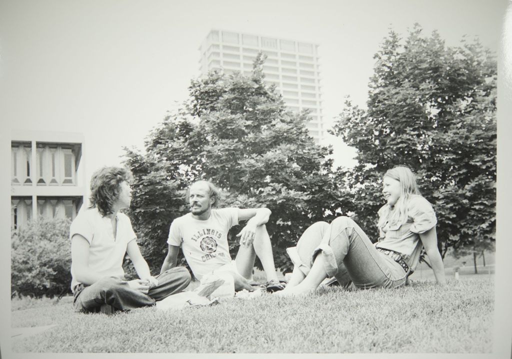 Miniature of Students sitting on the lawn