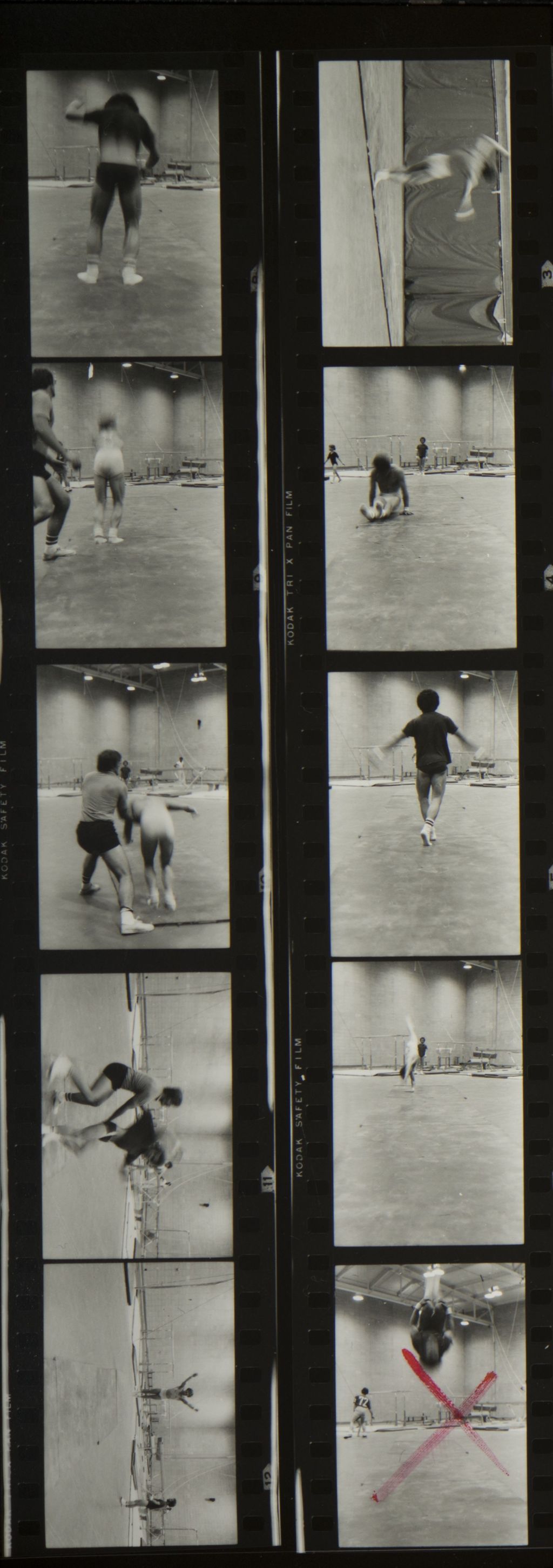 Miniature of Multiple views of gymnasts practicing in the Physical Education Building