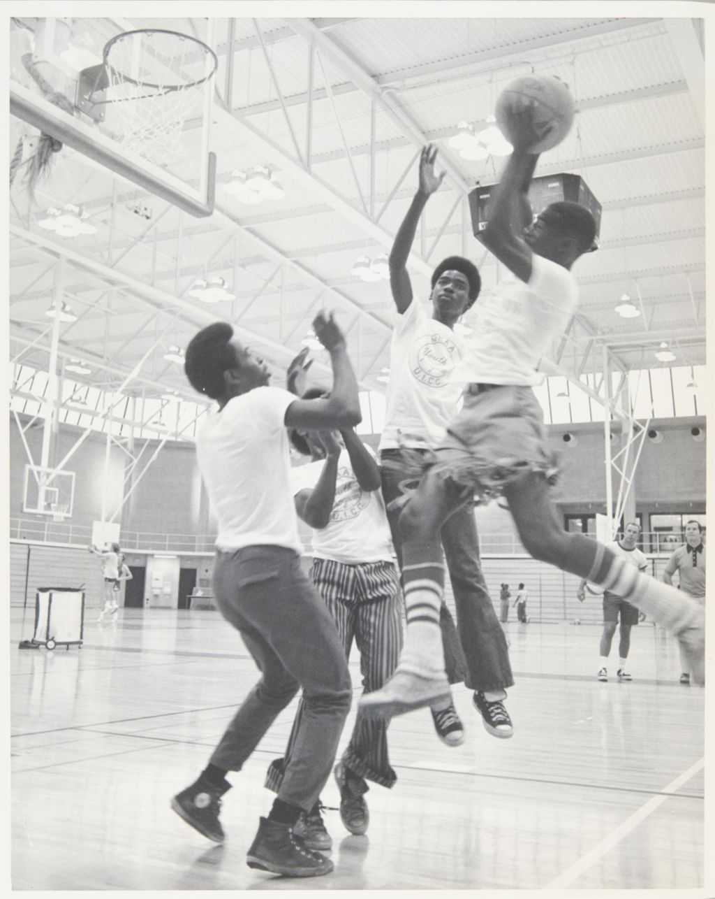 Miniature of Students participating in a basketball game during the NCAA National Summer Youth Sports Program