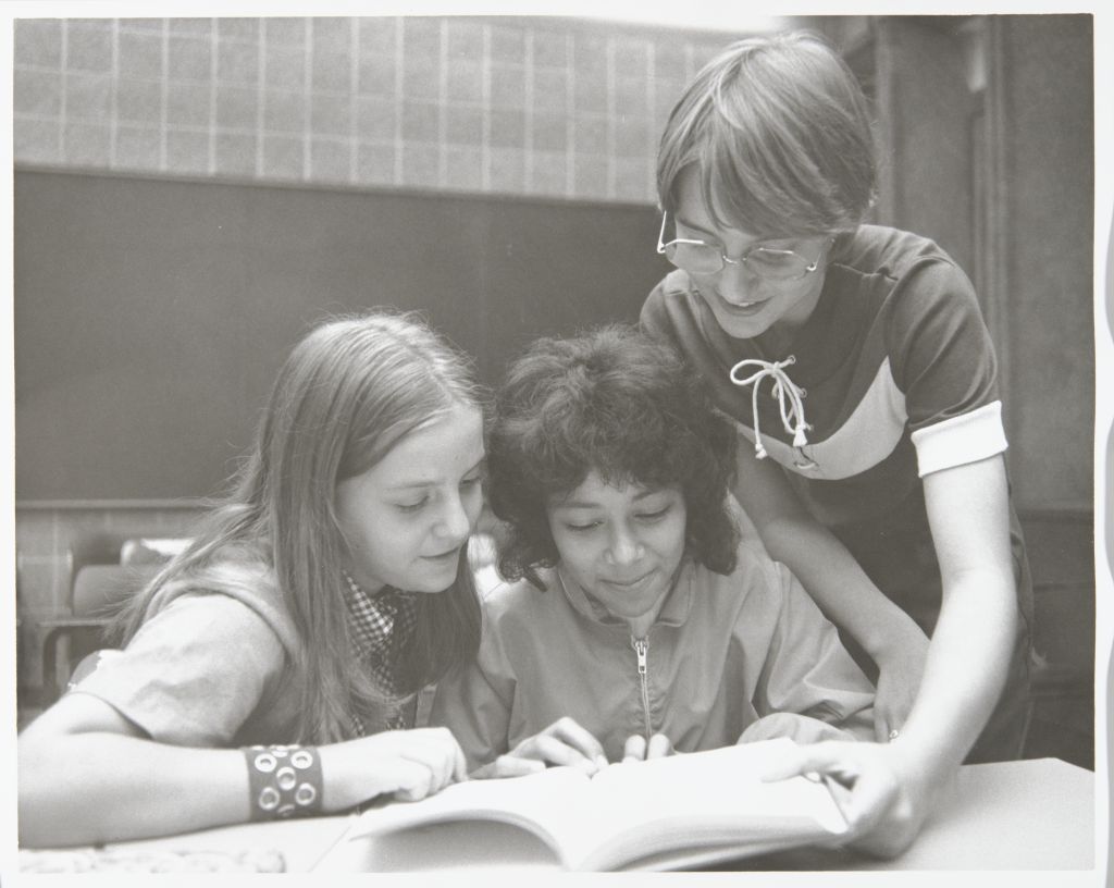 Miniature of Students and tutor engaged in the College of Education Tutoring Program