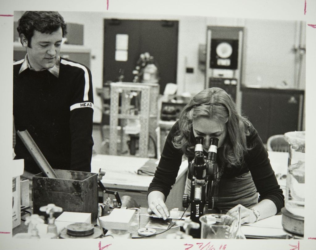 Miniature of Students at a microscope in a science lab