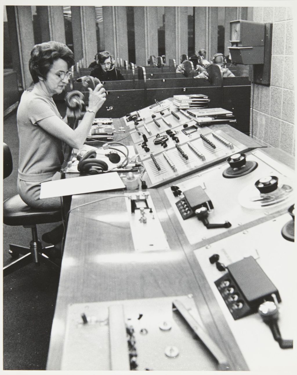 Miniature of Faculty member monitoring the audio board in the Language Laboratory in Grant Hall