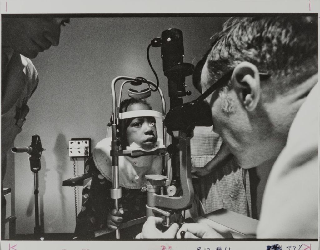 Miniature of Child receiving an eye exam in the College of Optometry