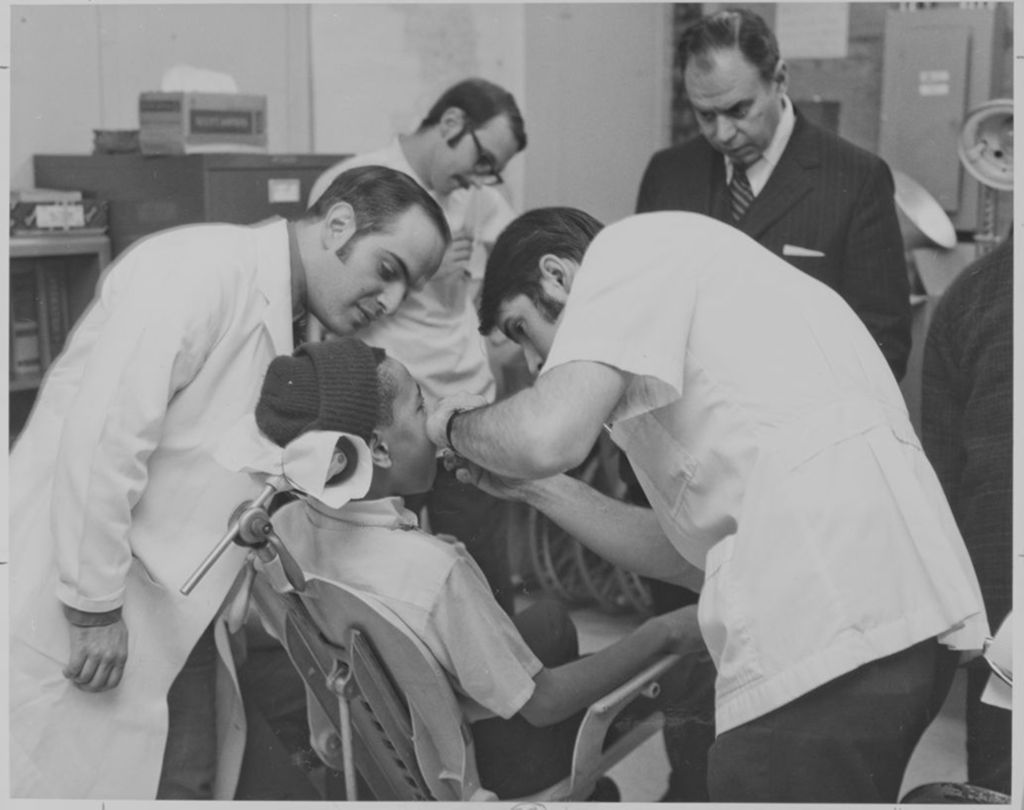 Miniature of Dental students with a patient in the College of Dentistry