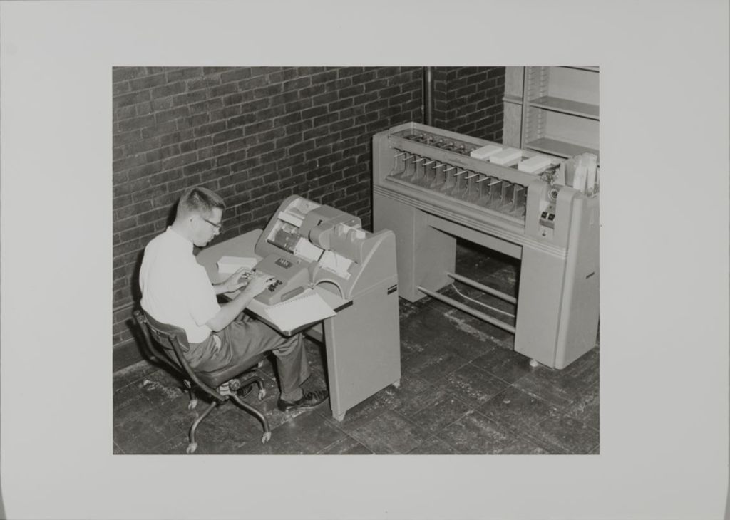Miniature of Student using an early model of a computer
