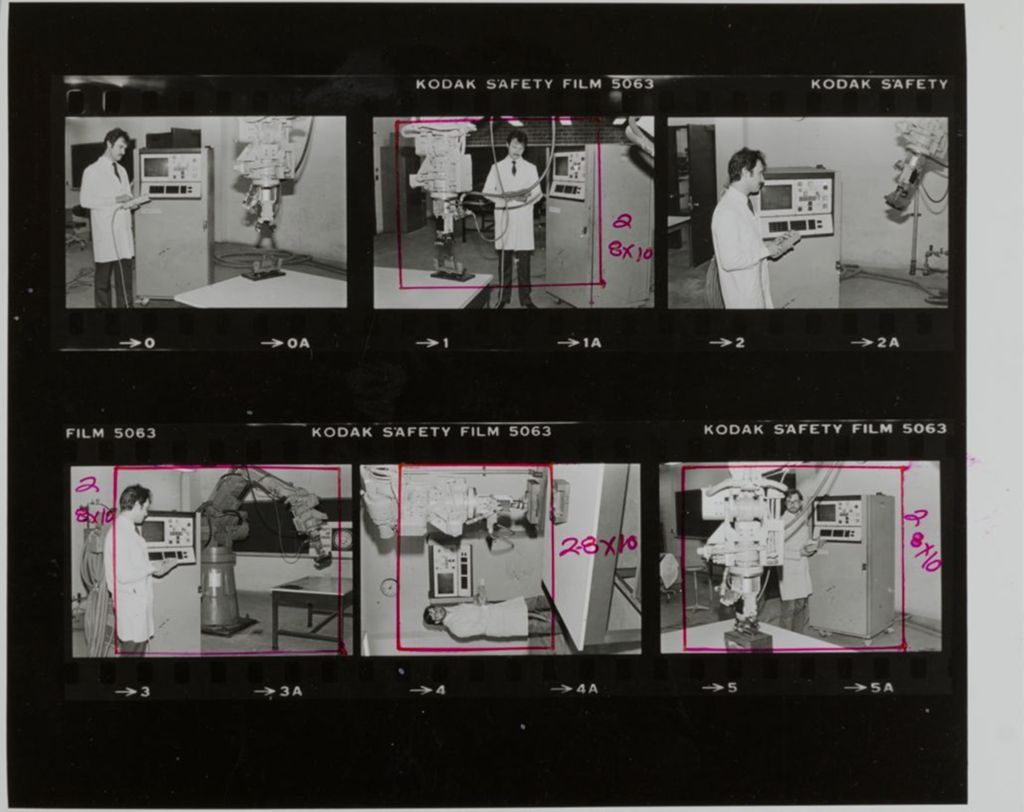 Miniature of Multiple views of a person operating robotics in the Robotics Laboratory