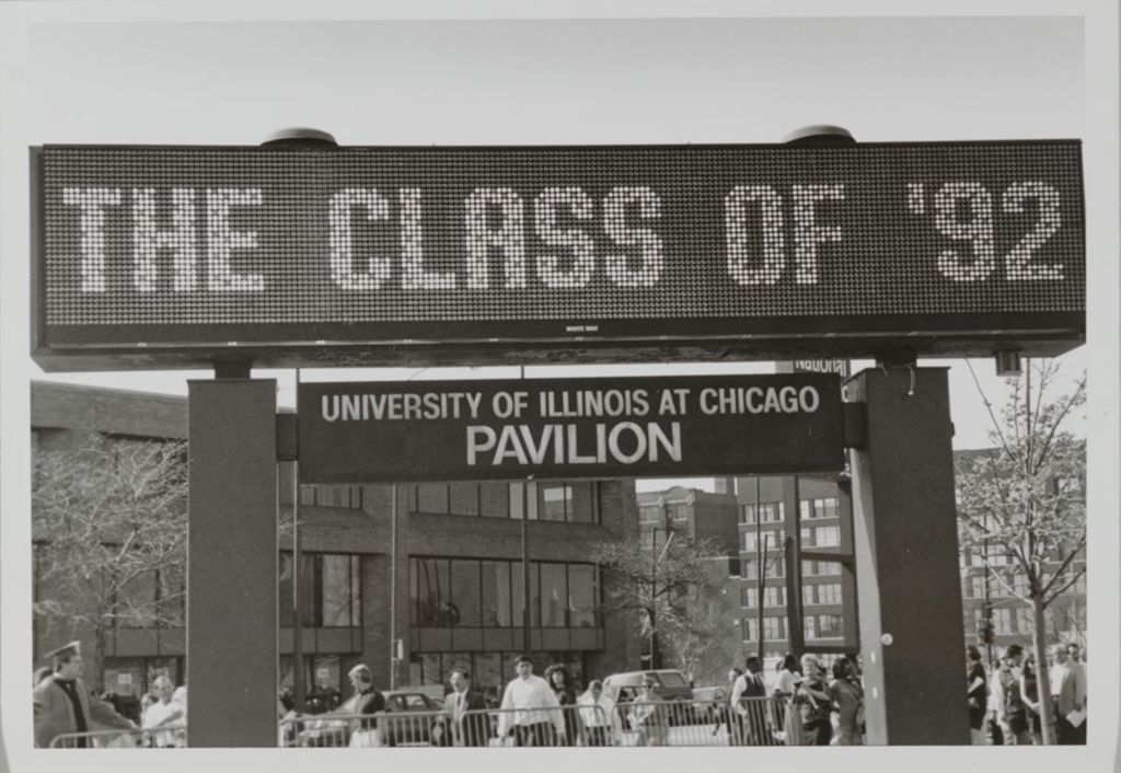 Sign that reads "Class of '92" in front of the Credit Union 1 Arena