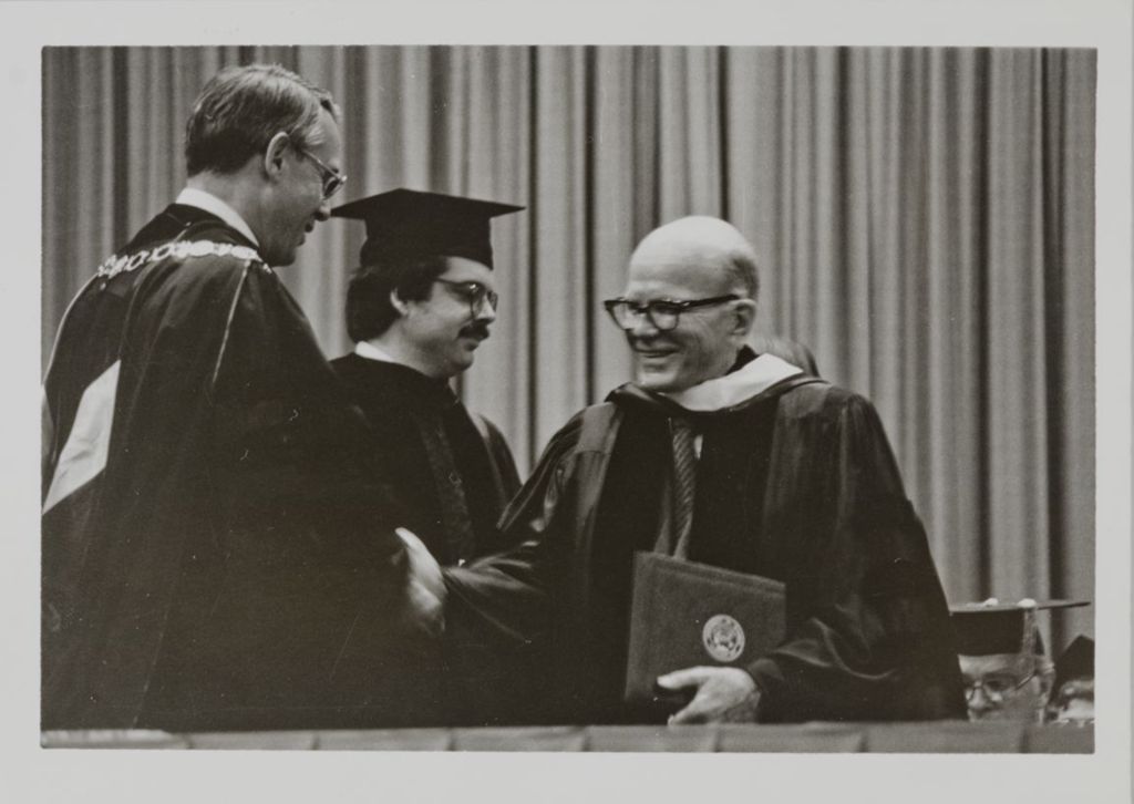 Miniature of Stanley O. Ikenberry (left) and honorary degree recipient Ralph W. Tyler (right) at graduation