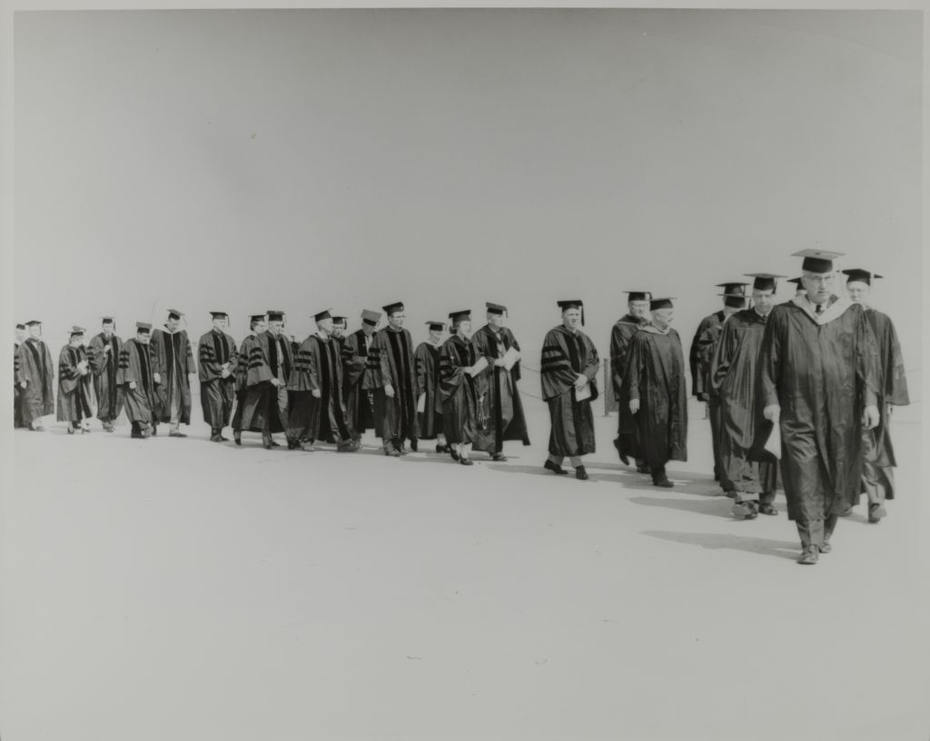 Miniature of Faculty members walking into the graduation ceremony