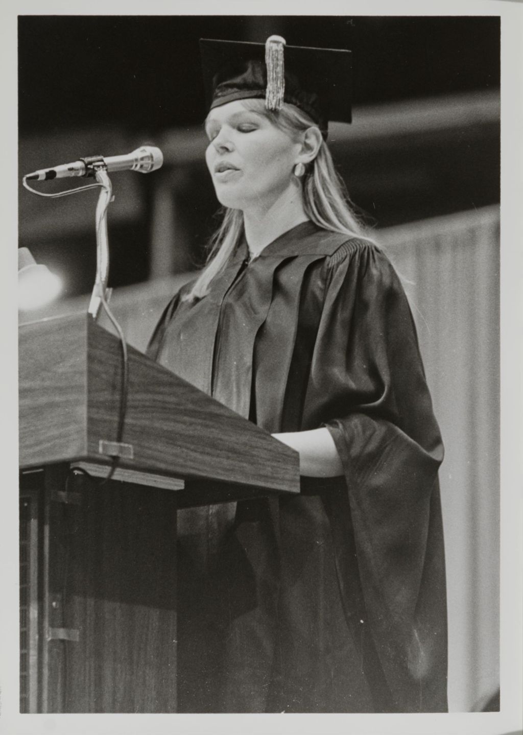 Unidentified person addressing the audience at the graduation ceremony