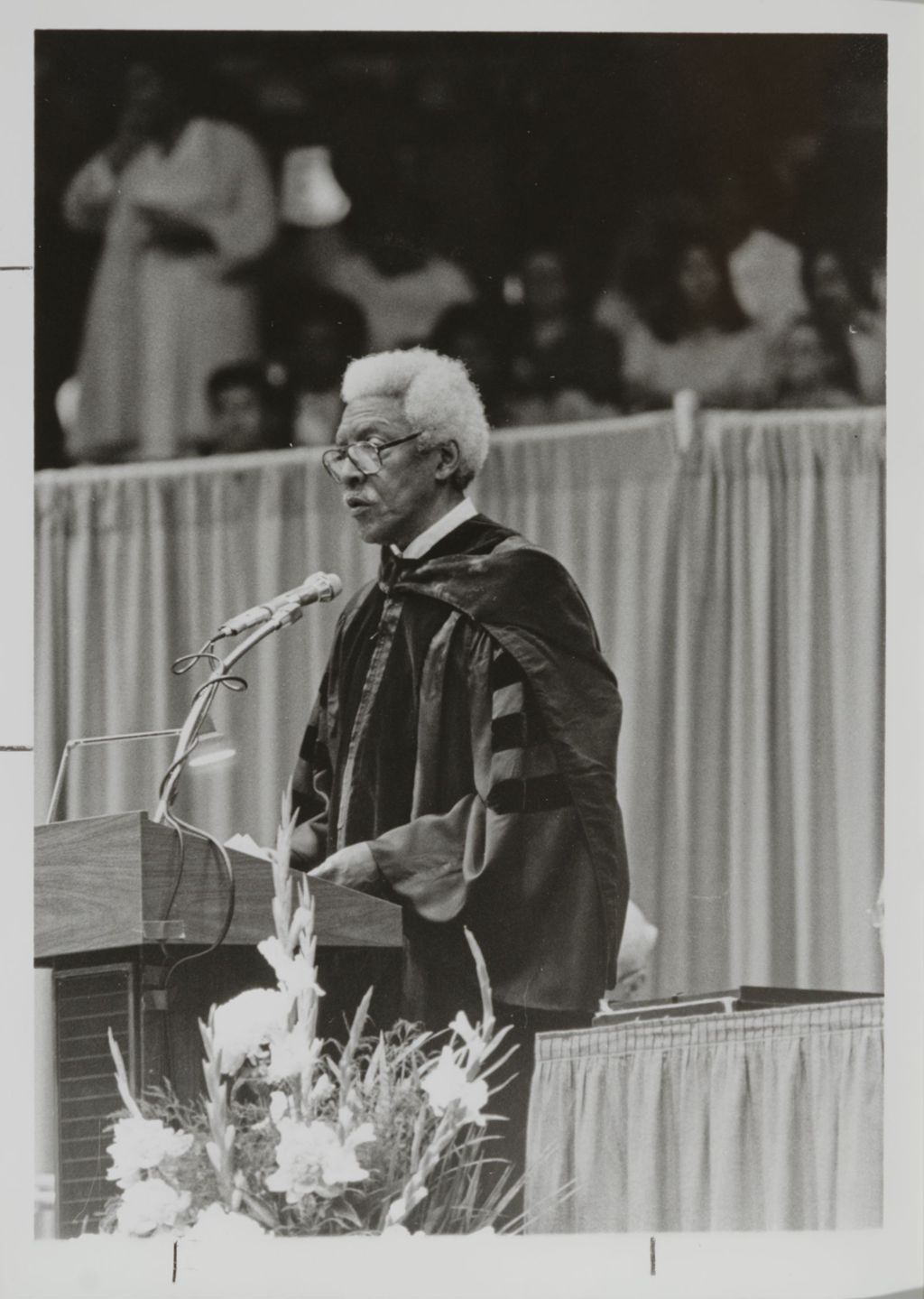 Miniature of Bayard Rustin addressing the audience at the graduation ceremony