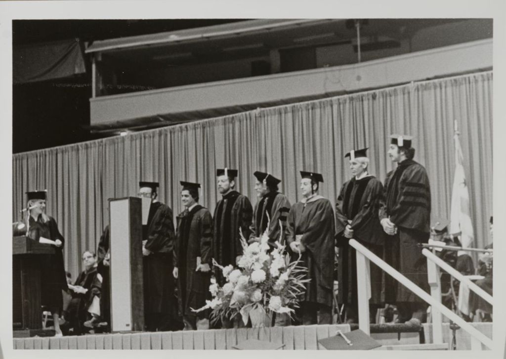 Participants on stage at the graduation ceremony