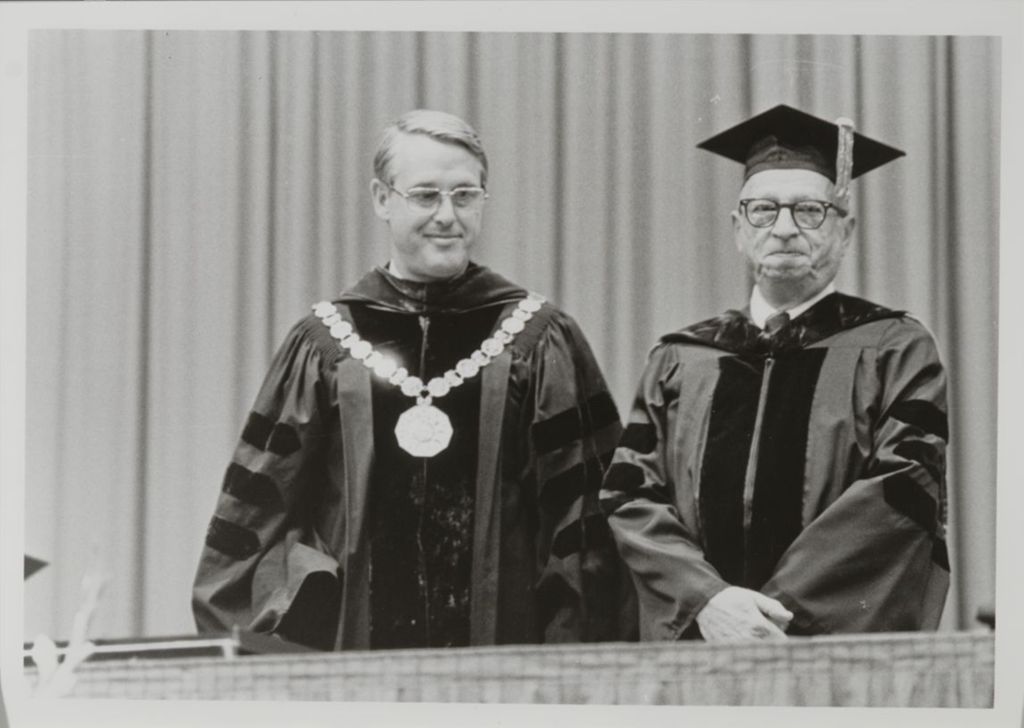 University of Illinois President Stanley O. Ikenberry and an unidentified faculty member (possibly with the last name Weingarten)