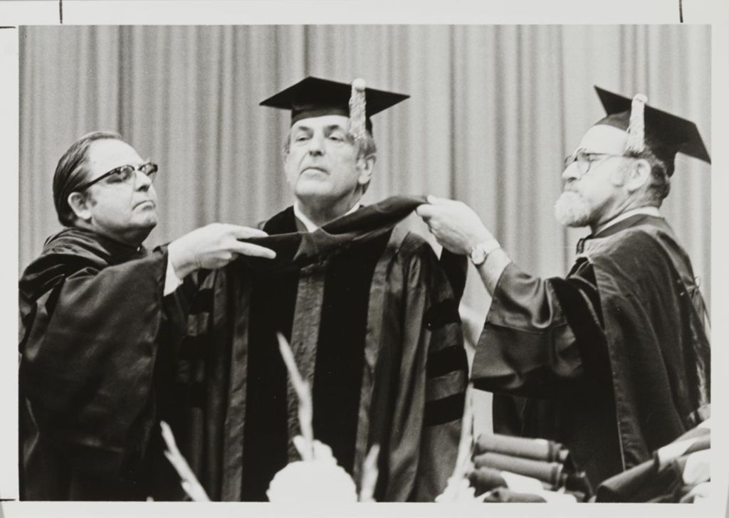 Miniature of Honorary degree recipient Joseph Block (center) at the graduation ceremony