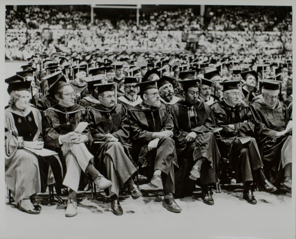 Row of speakers at the graduation ceremony