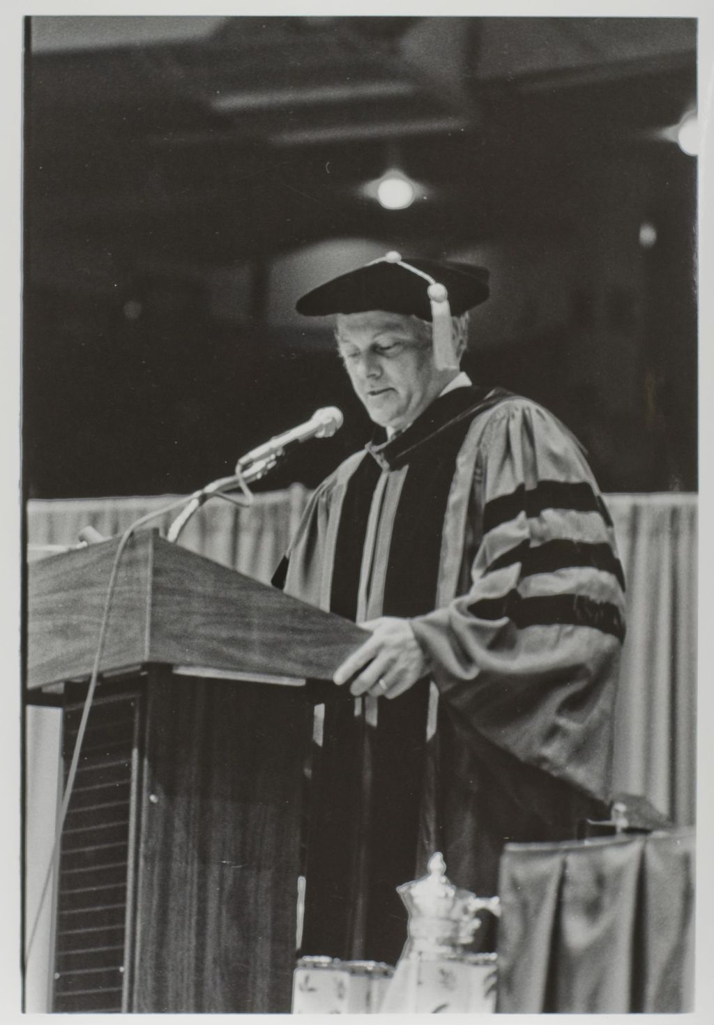 Miniature of Person speaking at the podium during the graduation ceremony