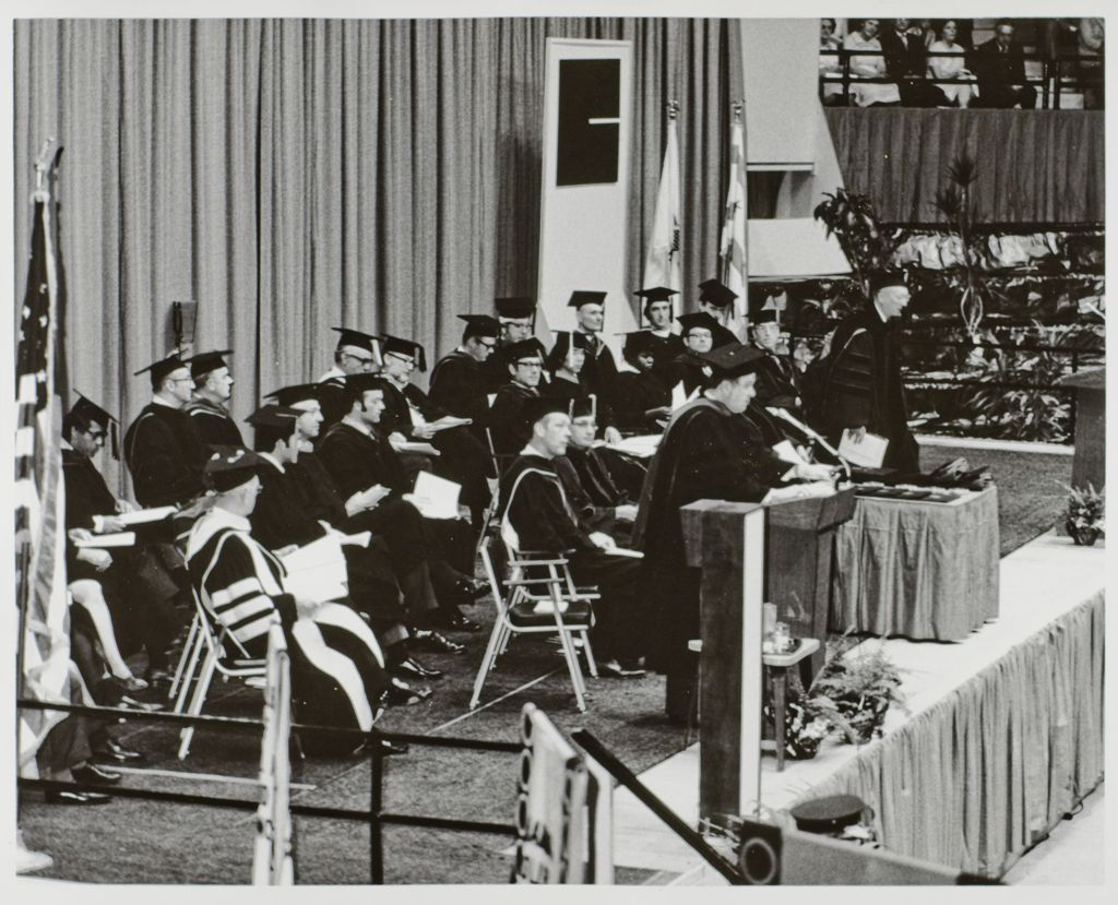Invited guests on stage at the graduation ceremony