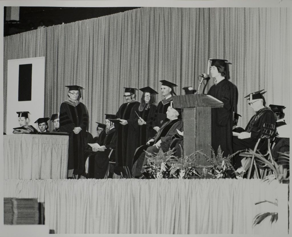 Miniature of University of Illinois President John E. Corbally at the graduation ceremony