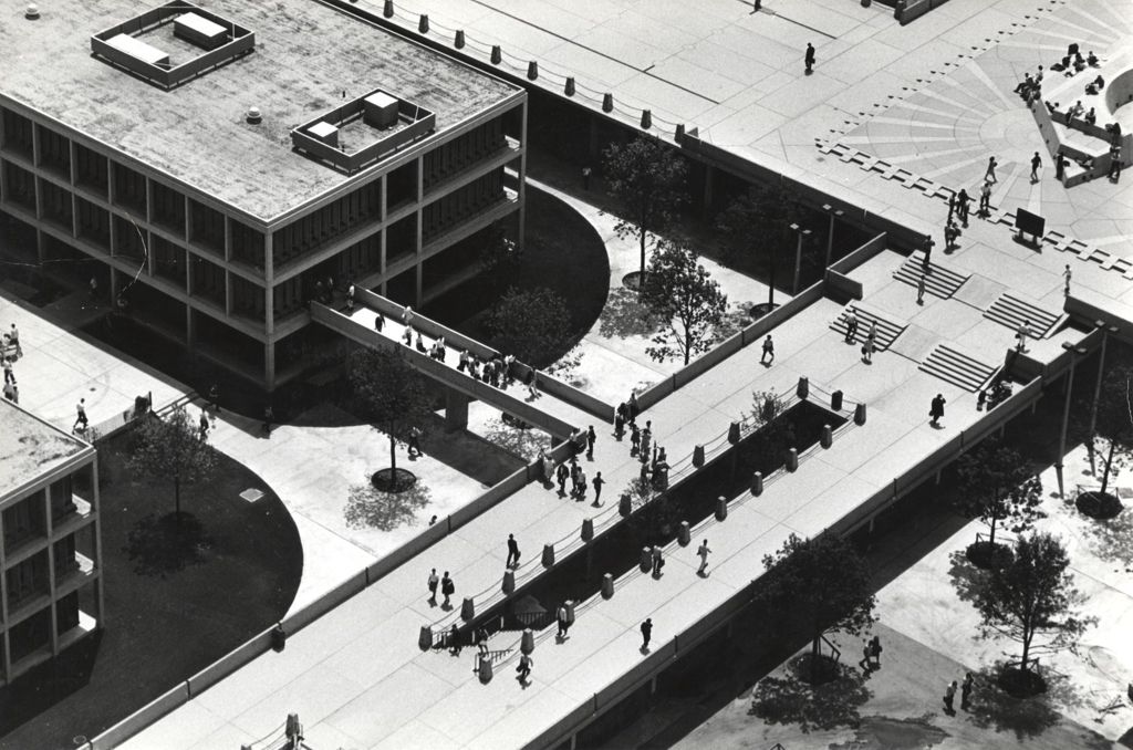 Aerial view of pedestrians on and below the elevated walkways
