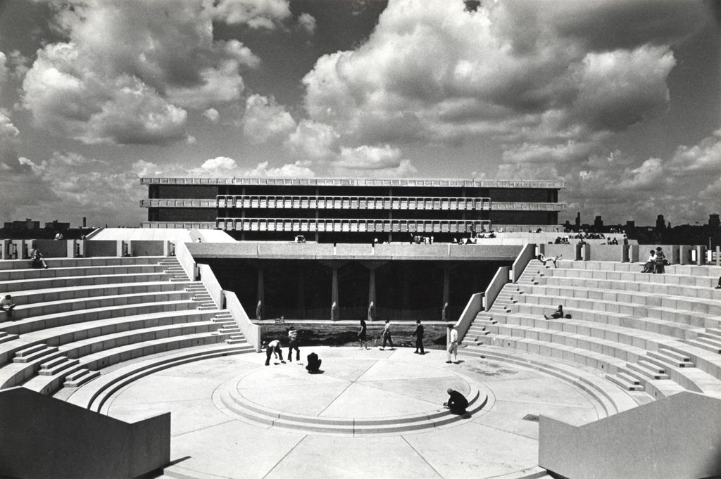 Miniature of Students in the Forum. Richard J. Daley Library is visible through the Forum