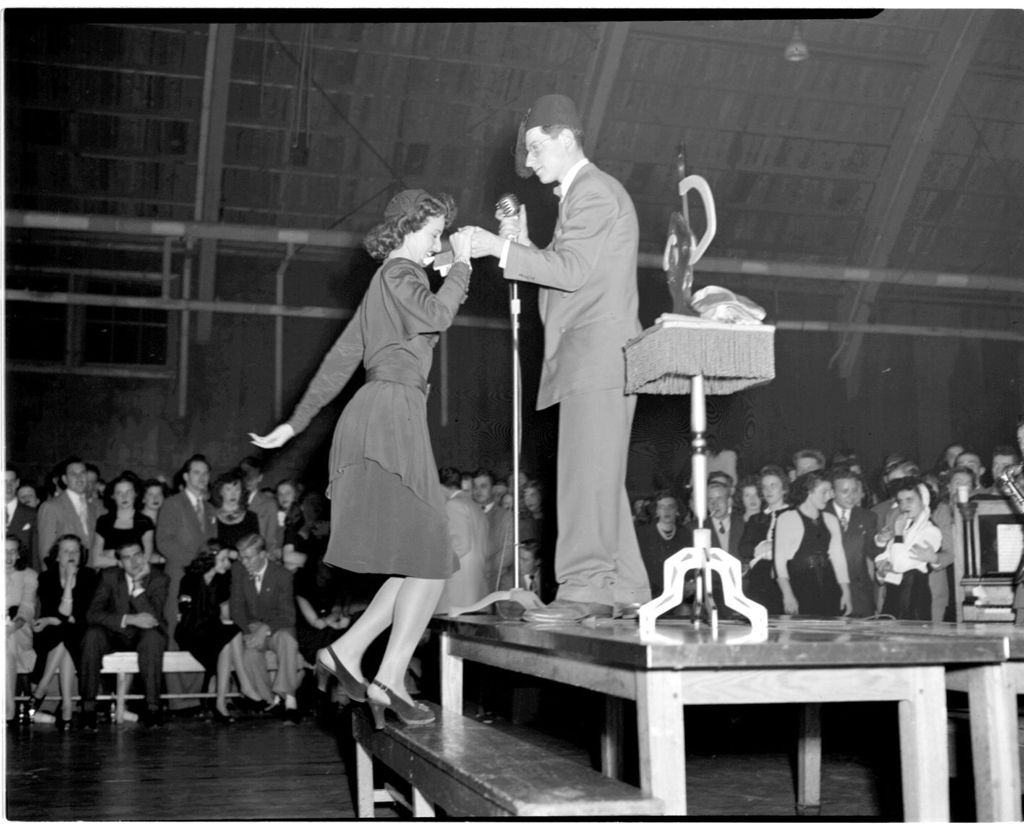 Miniature of Magician with Volunteer at Thanksgiving Dance, University of Illinois Chicago Undergraduate Division