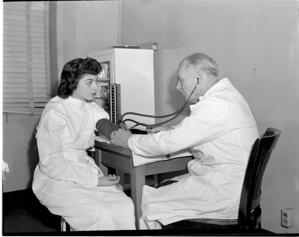 Miniature of Doctor Providing Medical Service, University of Illinois Chicago Undergraduate Division