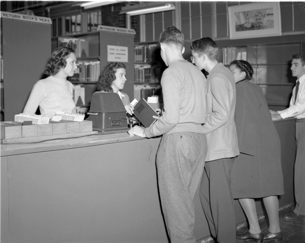 Students at Library Circulation Desk, University of Illinois Chicago Undergraduate Division