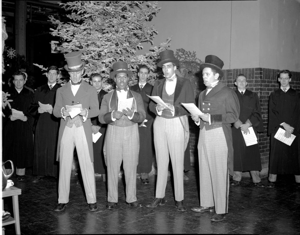 Miniature of Glee Club singing at Christmas Party, University of Illinois Chicago Undergraduate Division