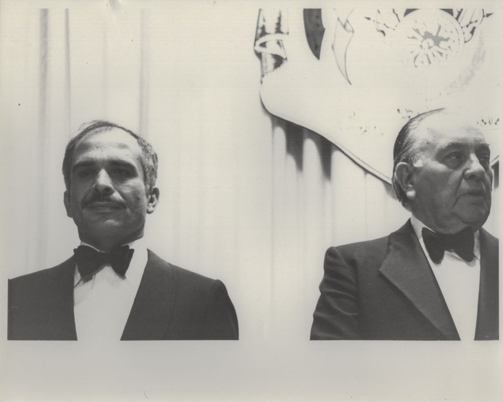 Miniature of King Hussein of Jordan and Richard J. Daley at a banquet